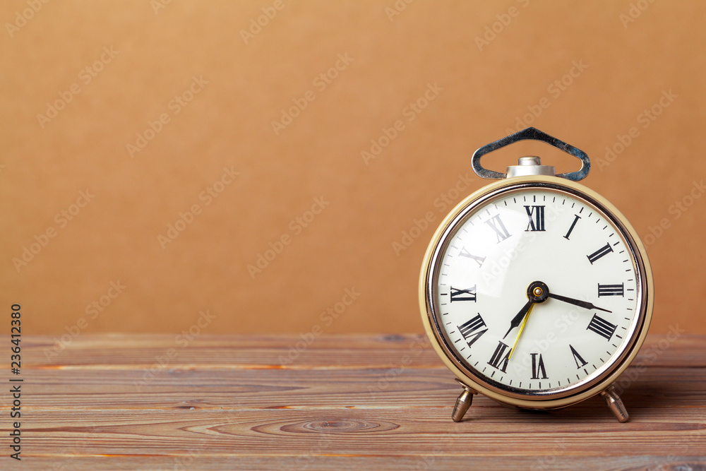 retro alarm clock on table retro alarm clock on table