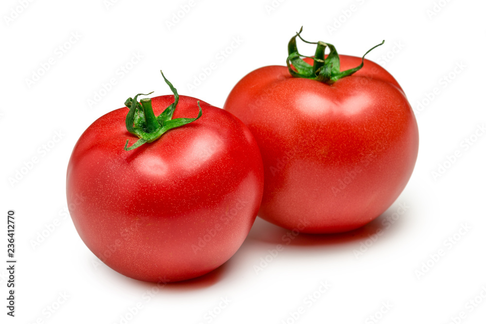 Tomatoes isolated on white background. Two fresh raw vegetables Tomatoes isolated on white background. Two fresh raw vegetables
