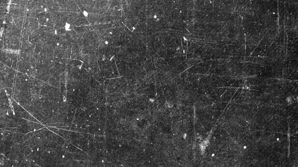 Texture of old surface on black background with white scratches