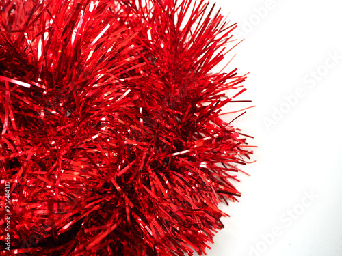 Christmas traditional decorations red tinsel. Xmas ribbon garland isolated on white background