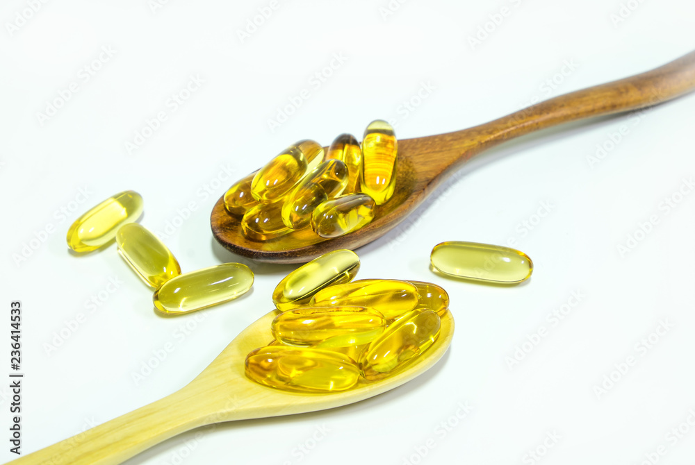 Vitamin Capsules Omega pills isolated on white background, Health care concept, Top view, Close up. Vitamin Capsules Omega pills isolated on white background, Health care concept, Top view, Close up.