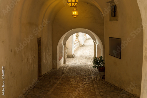 The corridor to Cloak Bridge view from IIIrd courtyard inside Cesky Krumlov Castle, Czech © Napatsan