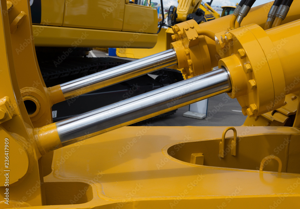 Detail of hydraulic bulldozer piston excavator arm Detail of hydraulic bulldozer piston excavator arm