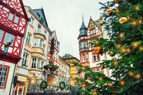 Christmas tree and traditional houses on the Christmas decorated Market square in Bernkastel-Kues, Germany