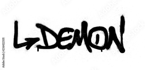 graffiti demon word sprayed in black over white
