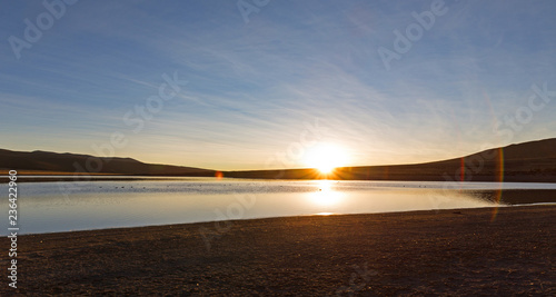 Sunset in Andes. lagoon Huayacota. High Andean landscape in the Andes.