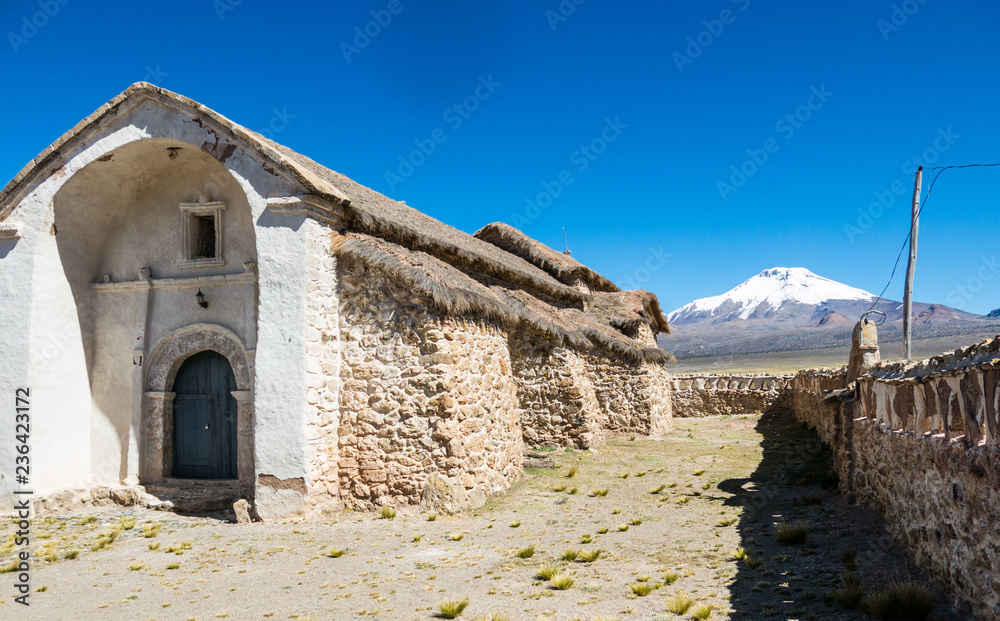 Stone church of the village of Sajama. The small Andean town of Sajama, Bolivian Altiplano. South America