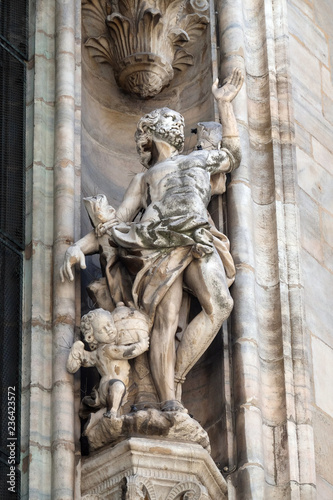 Statue of Saint on the facade of the Milan Cathedral  Duomo di Santa Maria Nascente  Milan  Lombardy  Italy