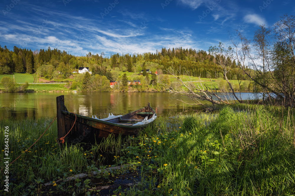 Boat by Jonsvatnet lake, summer in Norway