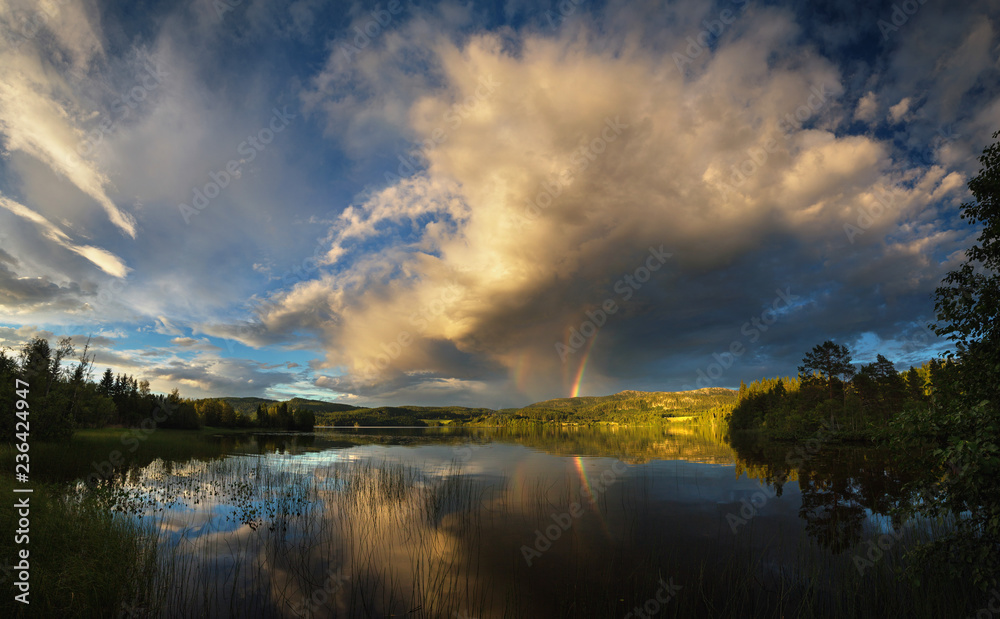 Obraz premium Rainbow above Jonsvatnet lake, Trondheim, Norway