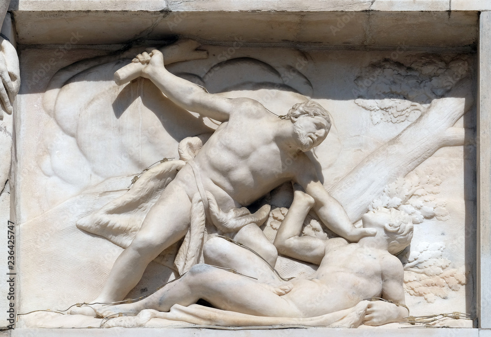 Cain killing Abel, marble relief on the facade of the Milan Cathedral, Duomo di Santa Maria Nascente, Milan, Lombardy, Italy