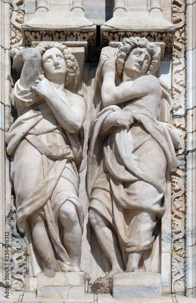 Caryatids on the main facade of the Milan Cathedral, Duomo di Santa Maria Nascente, Milan, Lombardy, Italy