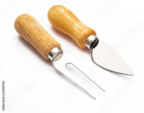 Fork and knife for cheese. Specific cutlery to cut, eat and puncture the cheeses. Isolated on white background.