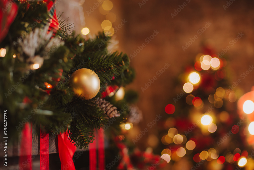 Obraz premium christmas decorative backgrounds with star gifts toys garland and bokeh lights holiday concept