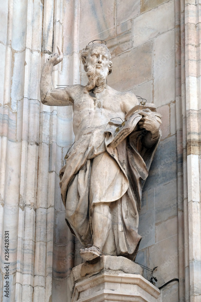 Obraz premium Statue of Saint on the facade of the Milan Cathedral, Duomo di Santa Maria Nascente, Milan, Lombardy, Italy