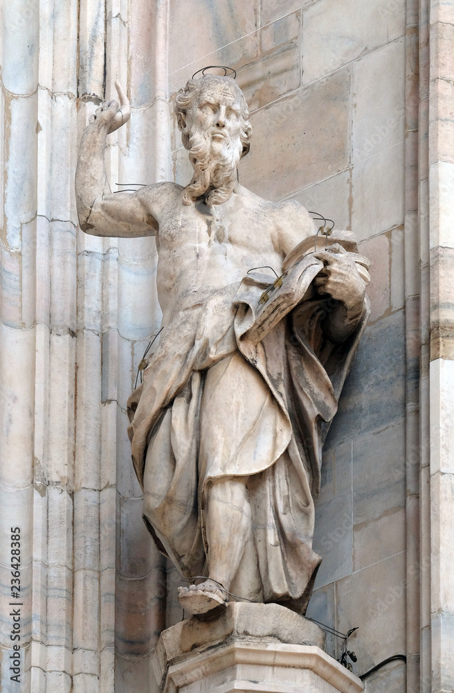 Statue of Saint on the facade of the Milan Cathedral, Duomo di Santa Maria Nascente, Milan, Lombardy, Italy