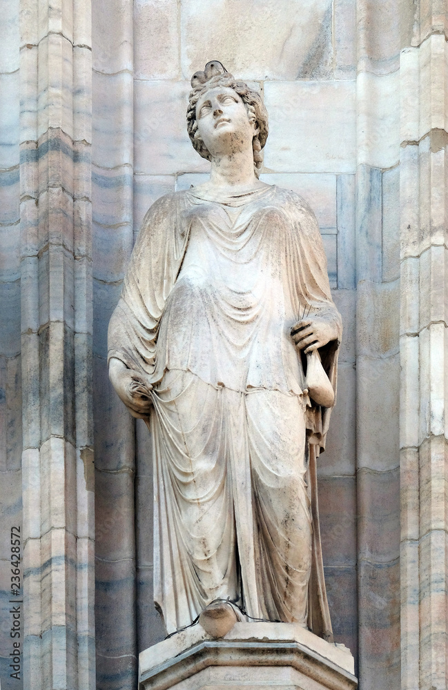 Statue of Saint on the facade of the Milan Cathedral, Duomo di Santa Maria Nascente, Milan, Lombardy, Italy