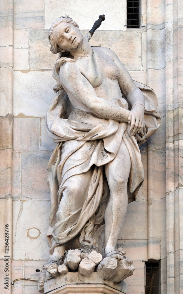 Obraz premium Statue of Saint on the facade of the Milan Cathedral, Duomo di Santa Maria Nascente, Milan, Lombardy, Italy