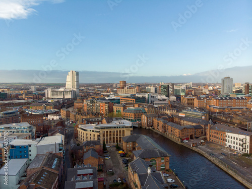 Aerial photo overlooking the Leeds City Center on a beautiful part cloudy day in West Yorkshire UK