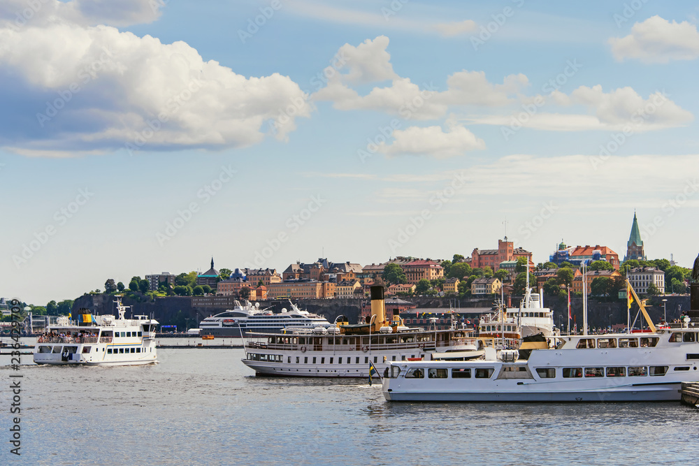 Boats and ships moored at the quay Stockholm city center, Sweden Boats and ships moored at the quay Stockholm city center, Sweden