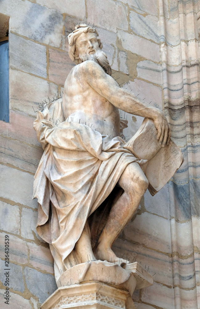 Obraz premium Statue of Saint on the facade of the Milan Cathedral, Duomo di Santa Maria Nascente, Milan, Lombardy, Italy