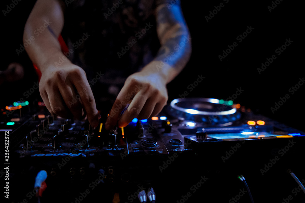 Dj playing disco house progressive electro music at the concert