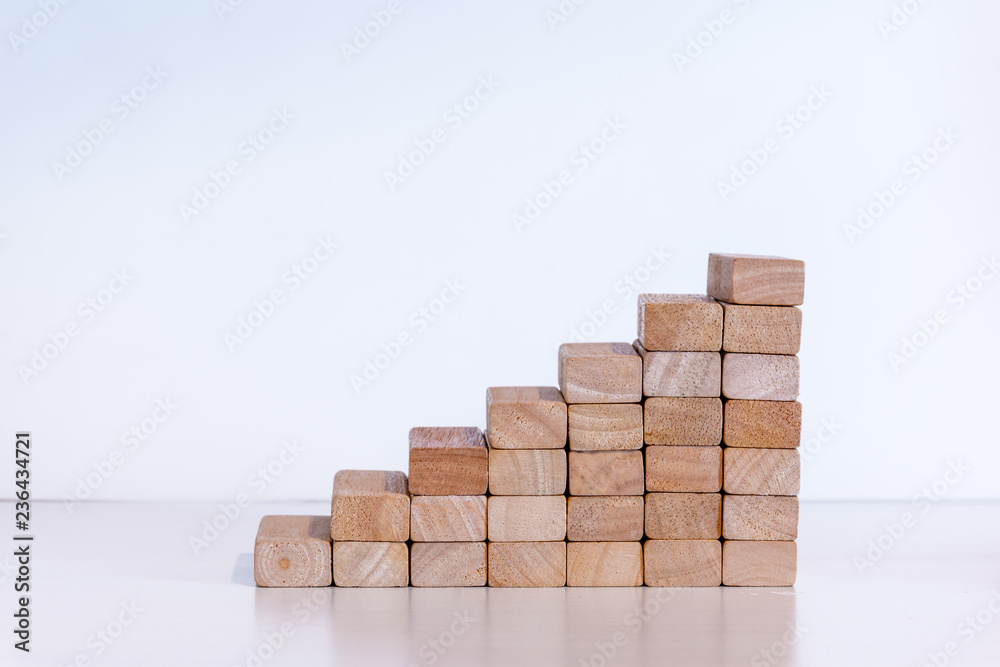 Steps on a stairs made of wooden blocks Steps on a stairs made of wooden blocks