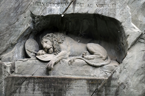 The Lion Monument or the Lion of Lucerne, designed by Bertel Thorvaldsen is a rock relief in Lucerne, Switzerland photo