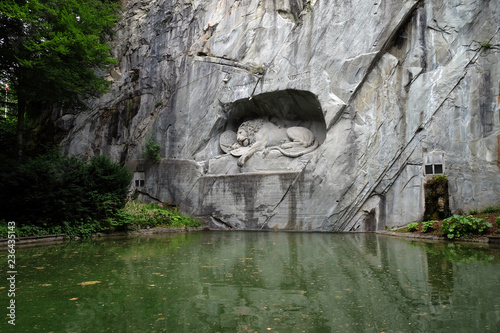 The Lion Monument or the Lion of Lucerne, designed by Bertel Thorvaldsen is a rock relief in Lucerne, Switzerland photo