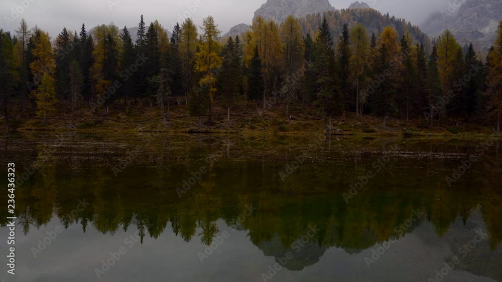 Autumn landscape of Antorno lake with famous Dolomites mountain peak of Tre Cime di Lavaredo in background in Italian Dolomites. Autumn landscape of Antorno lake with famous Dolomites mountain peak of Tre Cime di Lavaredo in background in Italian Dolomites.