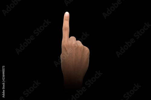 Male hand finger sign over dark background