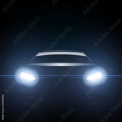 Dark Silhouette Of Sports Car With Headlight