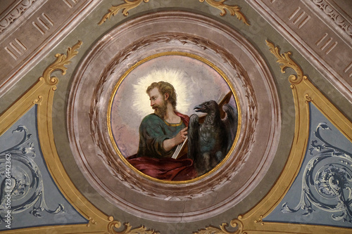 Saint John the Evangelist, ceiling fresco in the church of St. Victor on the Fishermen Island, one of the famous Borromeo Islands of Lake Maggiore, Italy photo