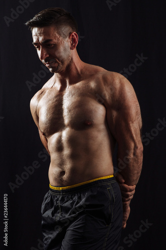 bodybuilder on black background