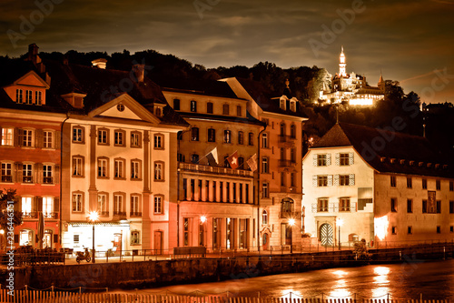 Lucerne Reuss river waterfront evening sepia color view