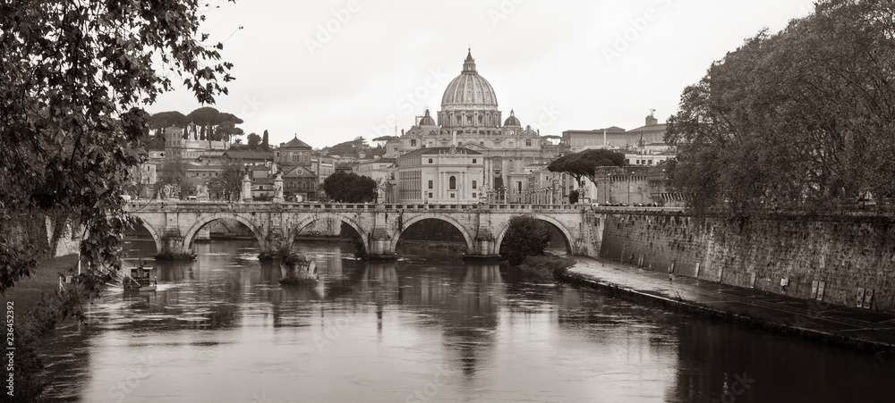 Tiber River with St. Peter's Basilica in the background in sepia