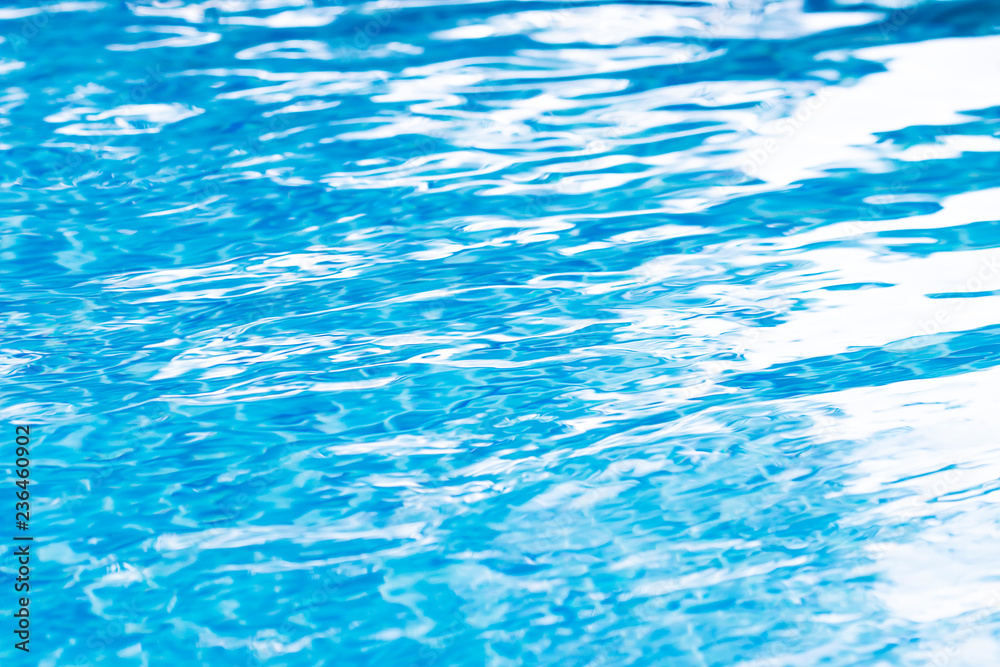 Waving blue water surface. blue clear fresh Water in jacuzzi.