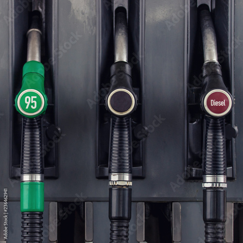 gasoline and diesel distributor at the gas station, gas pump nozzles