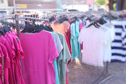 shop clothes for sales at market.