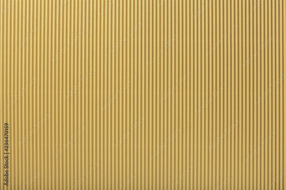 Texture of corrugated light golden paper, macro. Texture of corrugated light golden paper, macro.