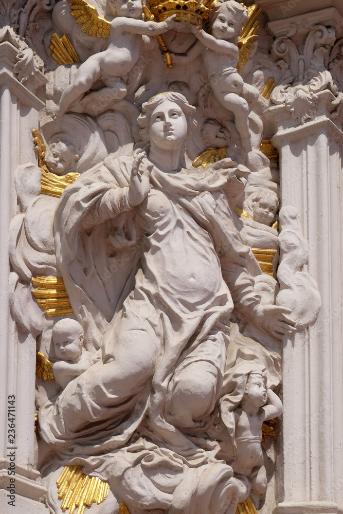 Fototapeta premium Virgin Mary, House of Falcon, the finest Rococo style building in the Wurzburg, Germany