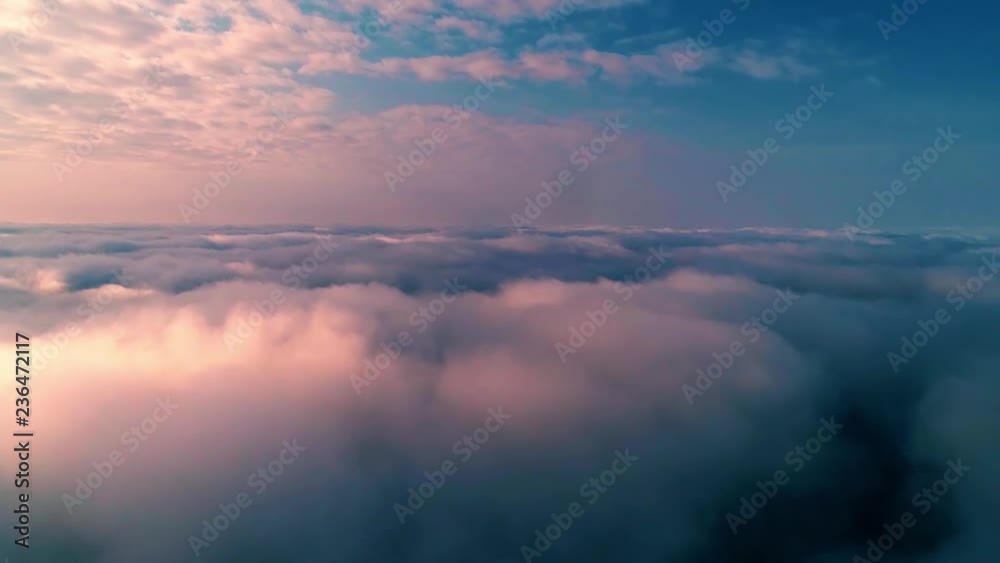 Aerial view of clouds and sky. Drone flies very high in evening sky. Romantic nature landscape Aerial view of clouds and sky. Drone flies very high in evening sky. Romantic nature landscape