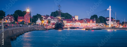 Lighthouse and pedestrian bridge in Ustka photo