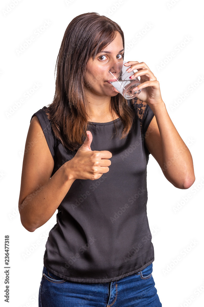 young woman drinking a glass of water isolated on a white background young woman drinking a glass of water isolated on a white background