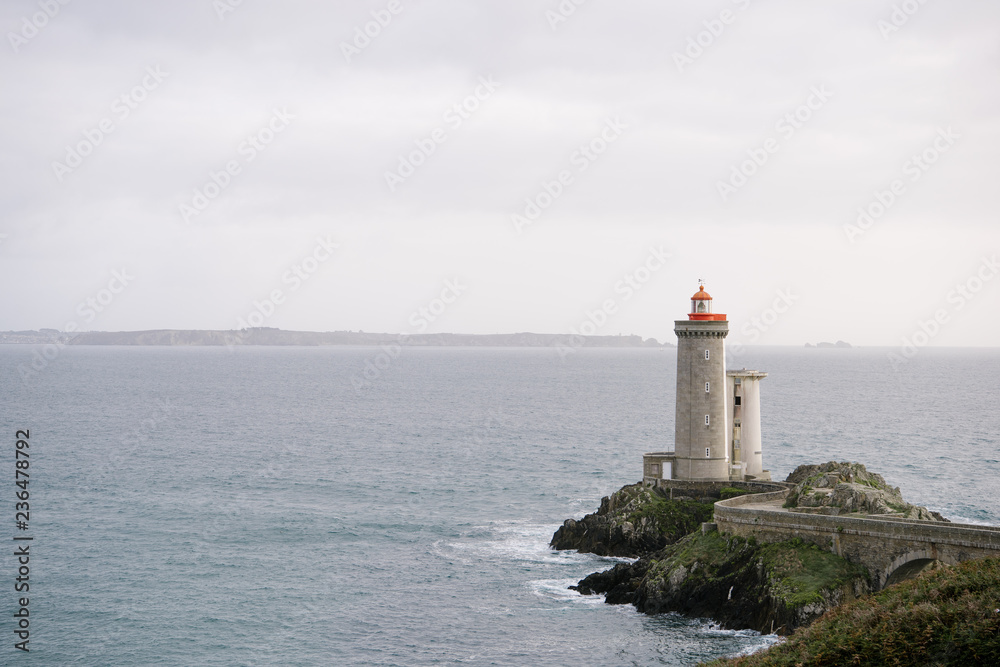 Wonderful view of old lighthouse on rock Wonderful view of old lighthouse on rock