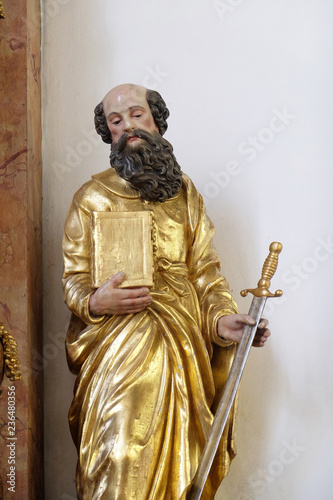 Saint Paul statue on the Beheading of John the Baptist altar in Maria im Grunen Tal pilgrimage church in Retzbach in the Bavarian district of Main-Spessart, Germany photo