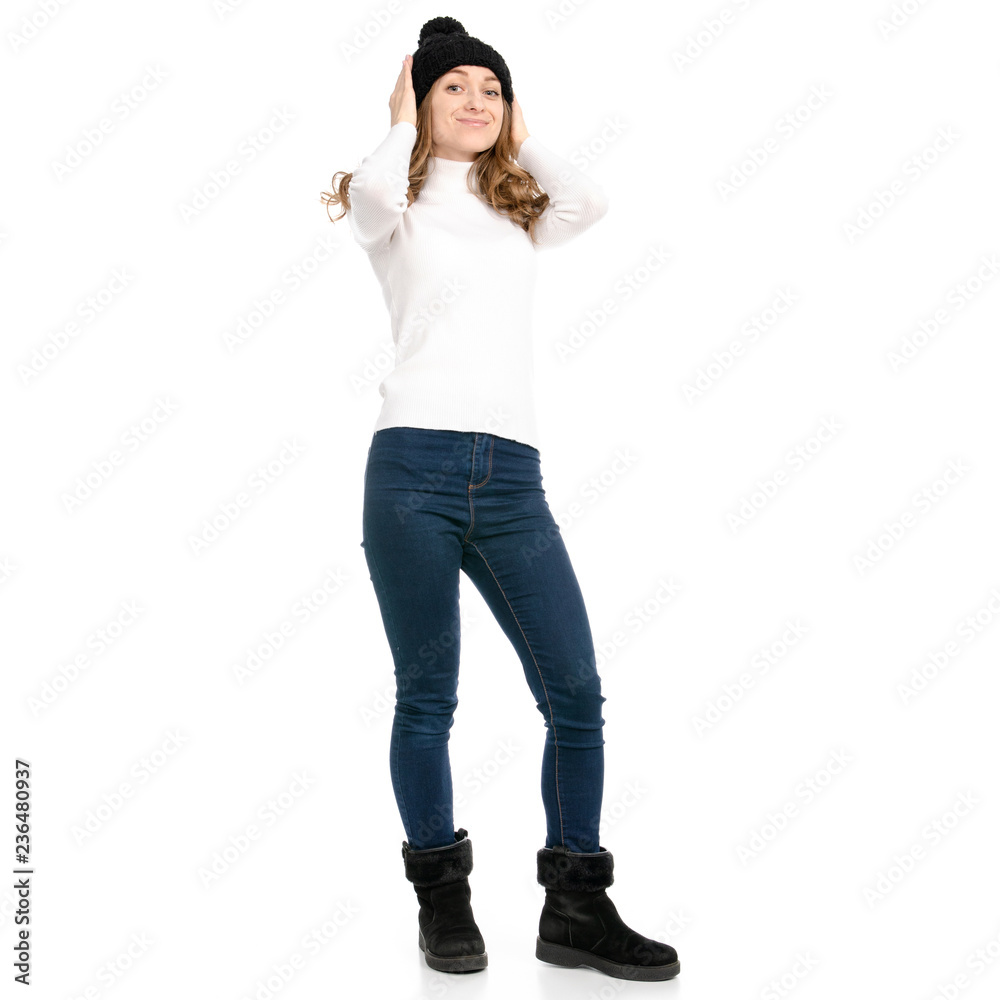 Beautiful woman in sweater jeans hat cold showing of positive emotions smile on white background isolation back view