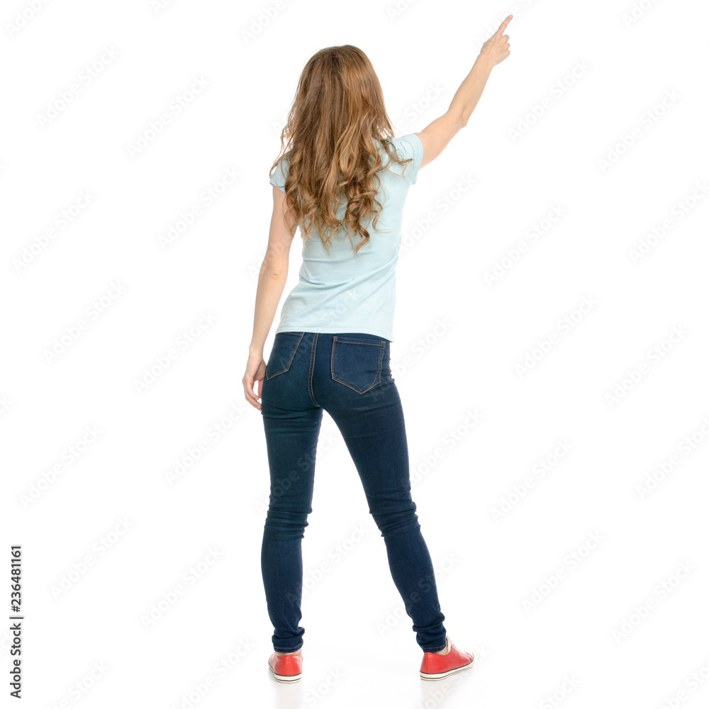 Beautiful woman goes walking showing on a white background. Isolation back view Beautiful woman goes walking showing on a white background. Isolation back view
