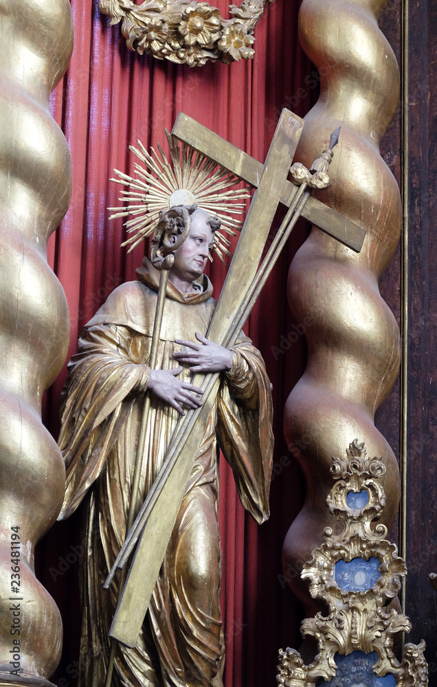 Obraz premium Saint Bernard of Clairvaux, statue on the main altar in Cistercian Abbey of Bronbach in Reicholzheim near Wertheim, Germany