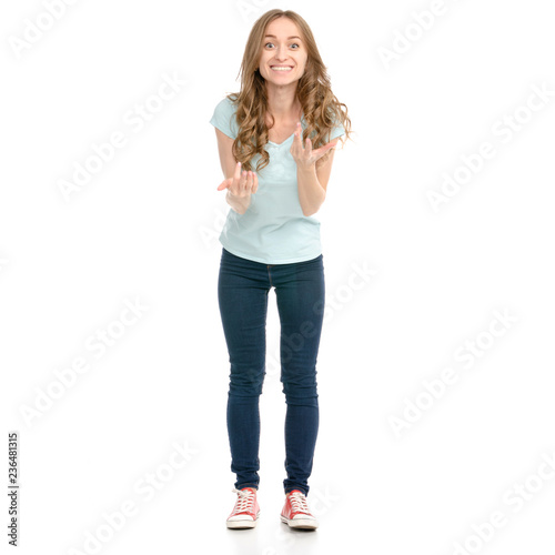 Beautiful woman in jeans showing of positive emotions happiness on a white background. Isolationion
